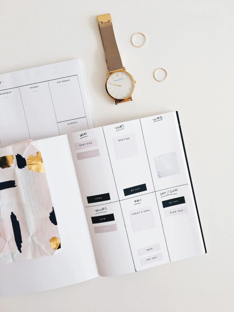 Picture of a calendar planner on a desk.